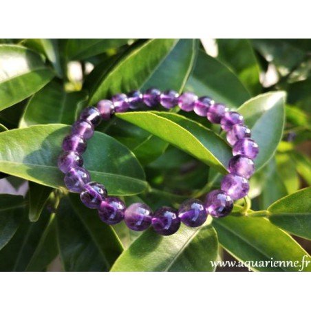 bracelet boules d'améthyste de 8mm, extensible pour poignets de 16 à 18 cm. Soulage stress, anxiété, insomnies.