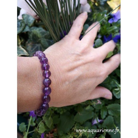 Améthyste, bracelet perles boules de 8mm, montage élastiqué. Pierre de sagesse et d'élévation spirituelle, calme le stress.