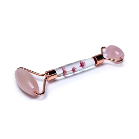 Rouleau de massage pour le visage en Quartz rose avec fleurs roses pour un soin profond et antiâge, révélateur d'éclat.