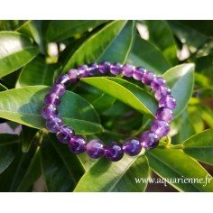 Bracelet Améthyste perles boules 8mm, qualité extra. Pierre de sagesse, favorise le calme et l'élévation spirituelle.