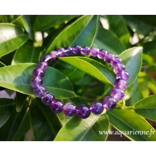 Bracelet Améthyste perles boules 8mm, qualité extra. Pierre de sagesse, favorise le calme et l'élévation spirituelle.