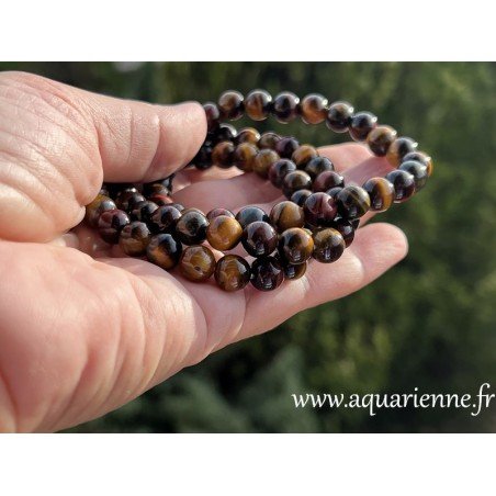 Bracelet élastiqué 3 pierres de protection : Œil de Tigre, Œil de Taureau et Œil de Faucon. Tour de poignet : 18/20 cm.